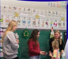 NHS hands out books to K-4 students